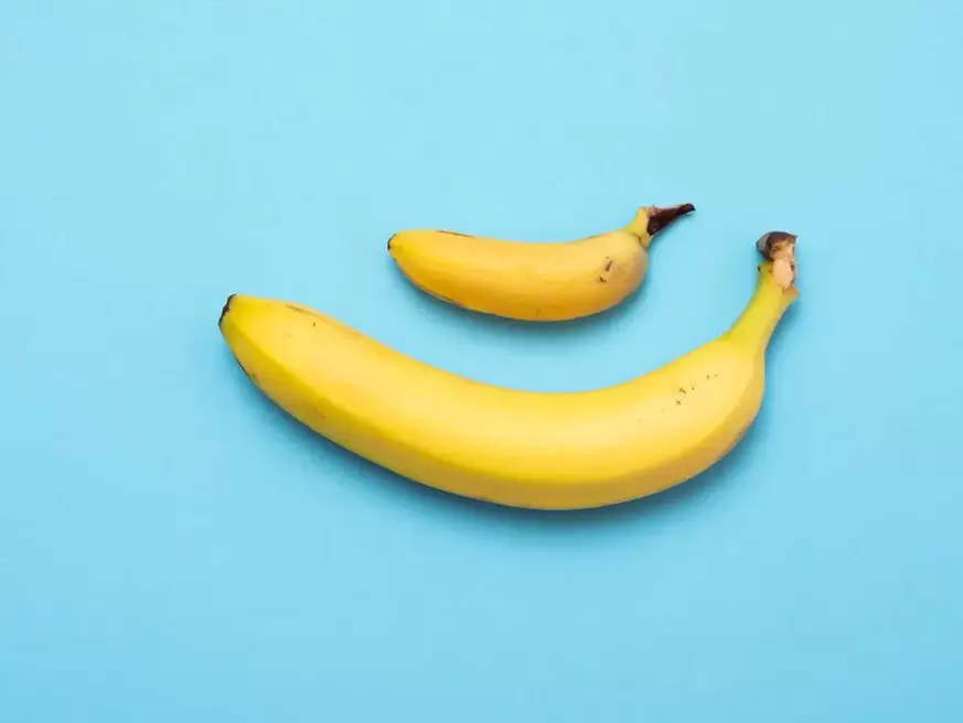 small and enlarged penis with grandeur in the example of the banana